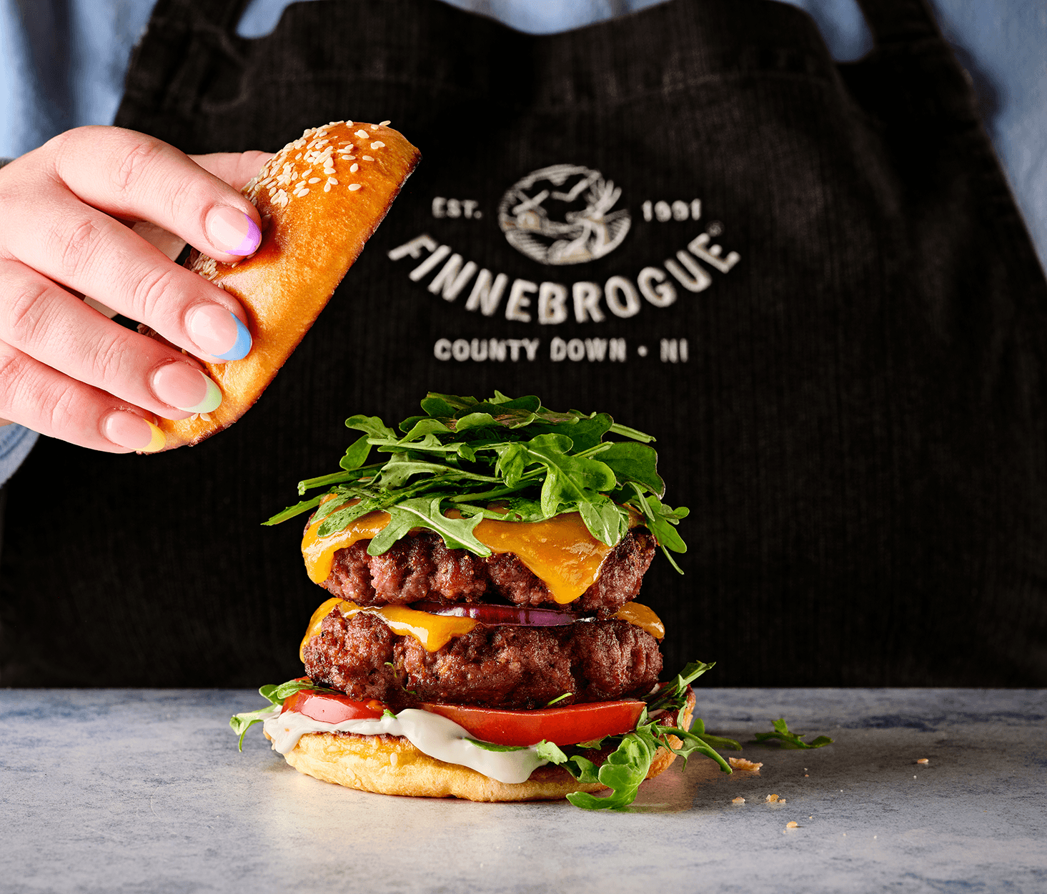 Finnebrogue Wagyu Burger on a taco bread.